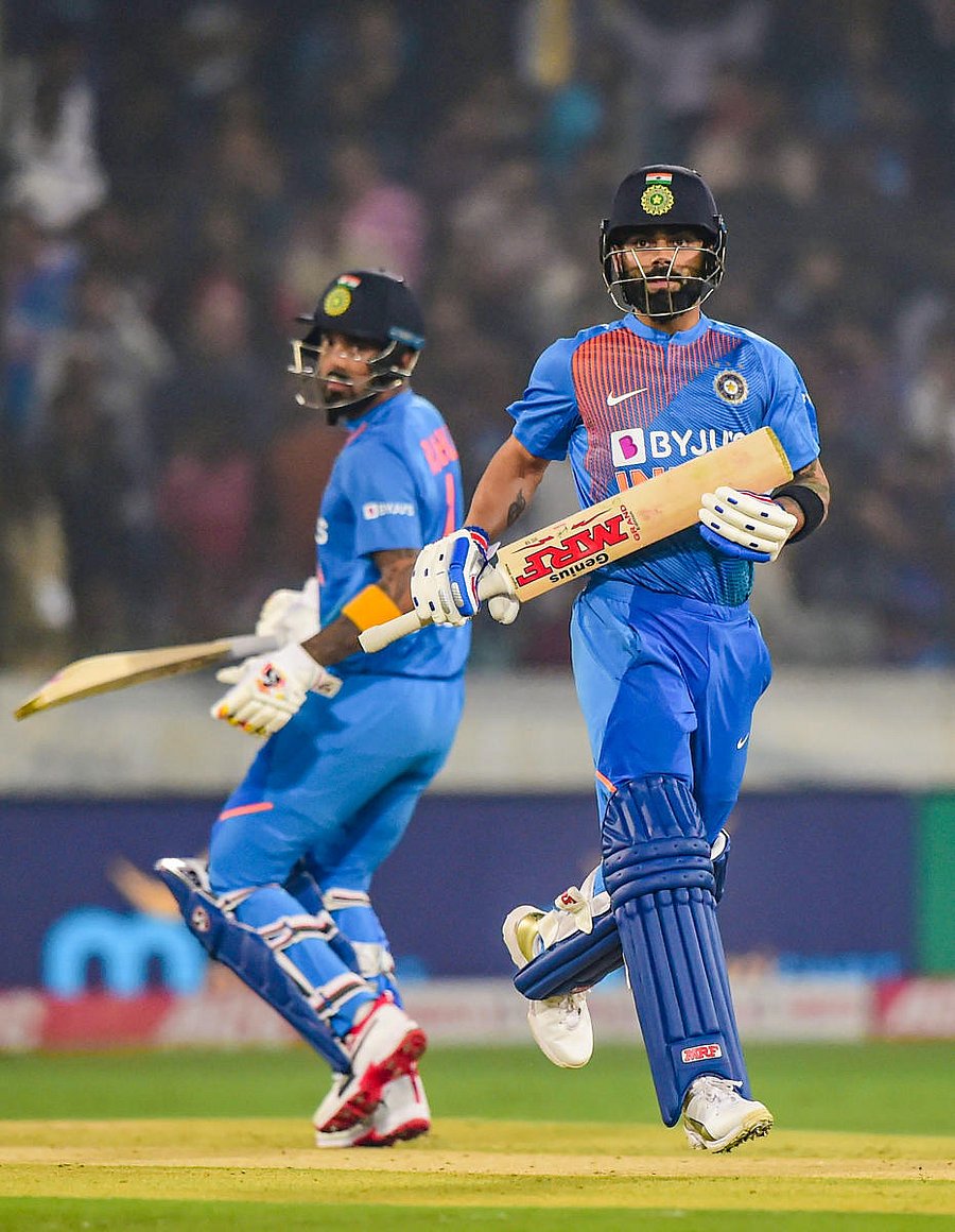 ndia's skipper Virat Kohli and teammate KL Rahul run between the wickets during the first T20 cricket match against West Indies (PTI Photo)