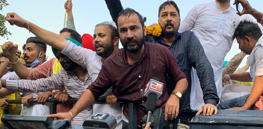 The Chandigarh Police used a water cannon to disperse the protesters, led by Aam Aadmi Party's Barnala MLA Meet Hayer (C). Credit: Twitter (@AAPPunjab)