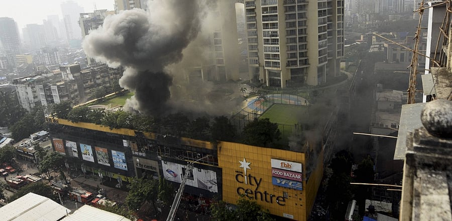 Smoke rises from City Central Mall after fire broke out in it, in Mumbai. Credit: PTI Photo