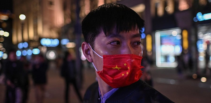 A man wearing a face mask as a preventive measure against the coronavirus disease. Credit: AFP