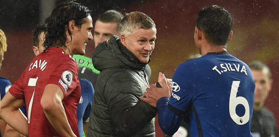 Manchester United manager Ole Gunnar Solskjaer, Manchester United's Edinson Cavani and Chelsea's Thiago Silva after the match. Credit: Reuters Photo