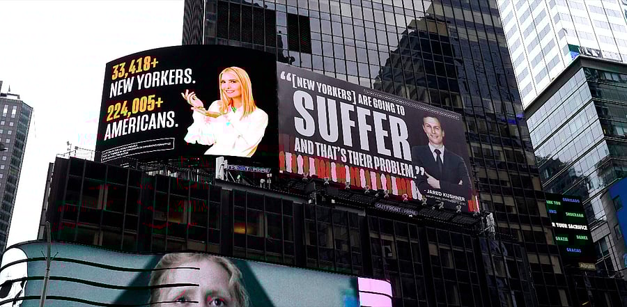 A billboard by The Lincoln Project is seen in Times Square on October 25, 2020 in New York, depicting Ivanka Trump presenting the number of New Yorkers and Americans who have died due to Covid-19 along with her husband Senior Advisor to the President Jared Kushner, with a Vanity Fair quote. Credit: AFP Photo