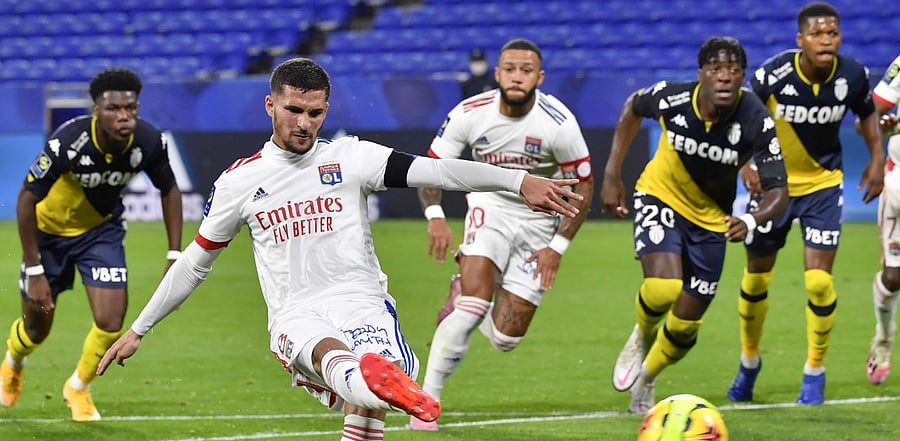 Lyon's forward Houssem Aouar scores a goal from the penalty-kick during the French L1 football match between Olympique Lyonnais (OL) and AS Monaco at the Groupama stadium in Decines-Charpieu. Credit: AFP Photo