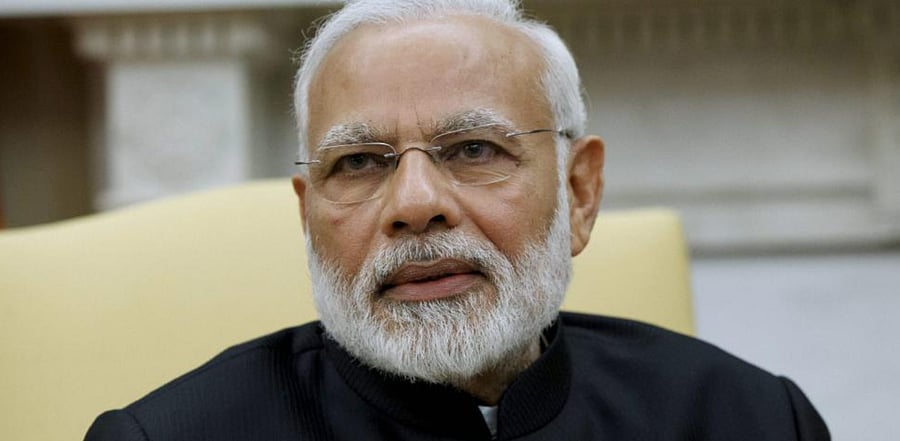 In February 2012, the SIT filed a closure report, giving a clean chit to Modi and 63 others, including senior government officials, saying there was "no prosecutable evidence" against them. Credit: AP Photo