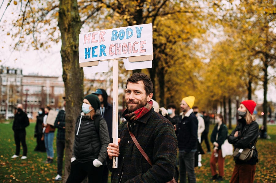 People take part in a protest against the ruling by Poland's Constitutional Tribunal that imposes a near-total ban on abortion, in Amsterdam, Netherlands. Credit: Reuters