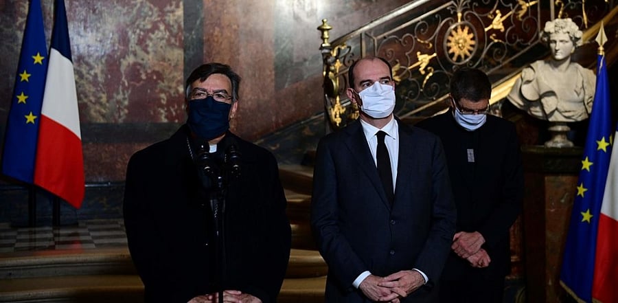 (From L) Archbishop of Paris Michel Aupetit, French Prime Minister Jean Castex and President of Bishops' Conference of France Eric de Moulins-Beaufort talk to the press after their meeting at the Matignon Hotel in Paris. Credit: AFP.