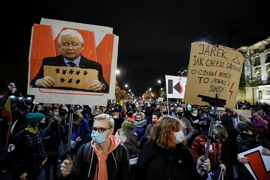 People take part in a protest against the ruling by Poland's Constitutional Tribunal that imposes a near-total ban on abortion, in Warsaw, Poland. Credit: Reuters