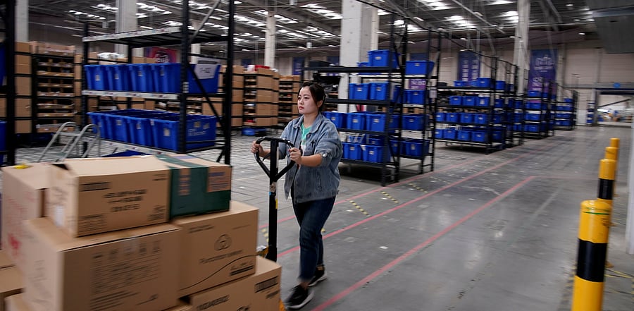 Employee works at a Cainiao warehouse, Alibaba's logistics unit in Wuxi, Jiangsu province, China. Credit: REUTERS