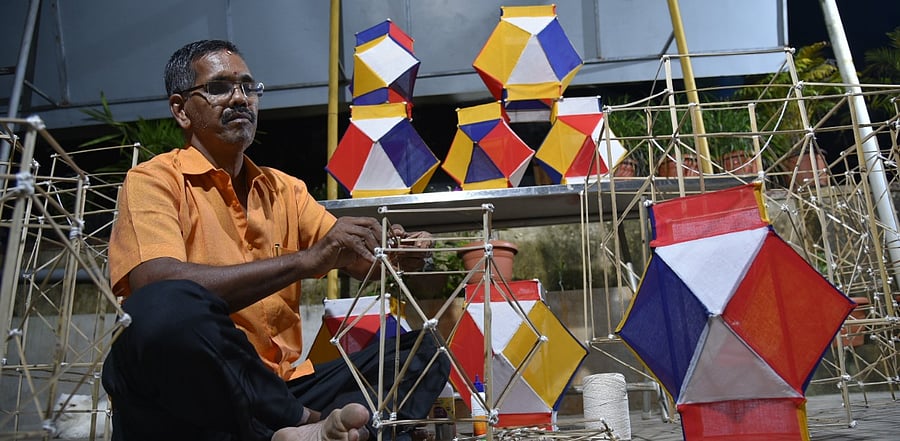 Nagaraj Upadhya Bailoor busy in making traditional Goodudeepa. Credit: DH Photo.