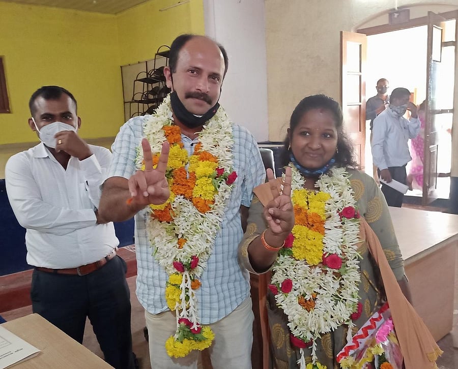 Newly elected Virajpet Town Panchayat president Sushmitha and vice-president Harshavardhan.