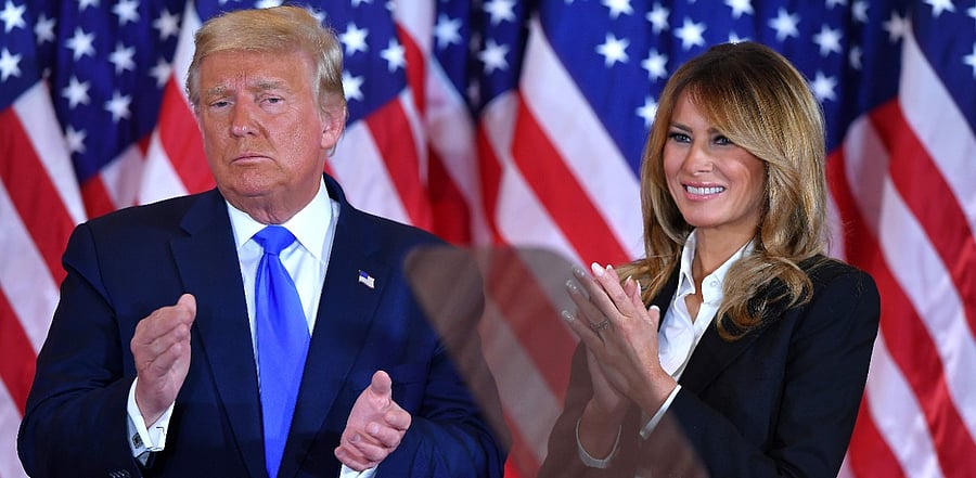 US President Donald Trump claps alongside US First Lady Melania Trump after speaking during election night in the East Room of the White House in Washington, DC. Credit: AFP Photo