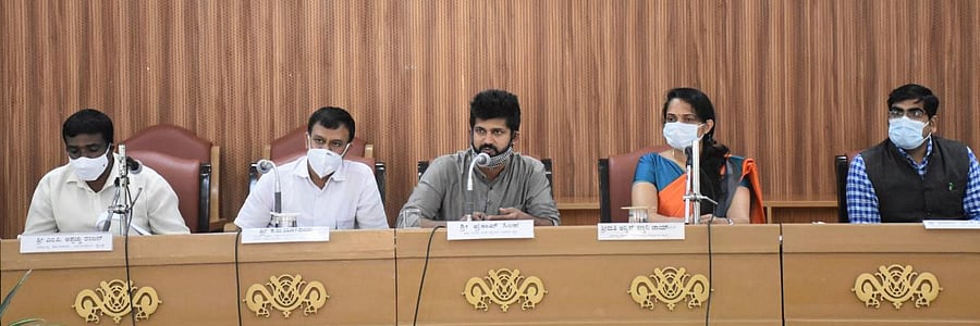 MP Pratap Simha speaks during a District Development Coordination and Monitoring Committee meeting in Madikeri.