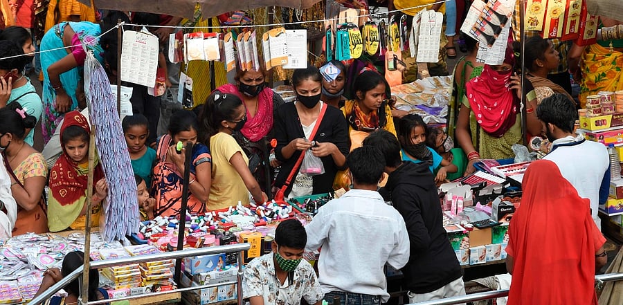 Shoppers throng a market area between Teen Darwaja and Bhadrakali Temple ahead of Diwali. Credit: AFP Photo