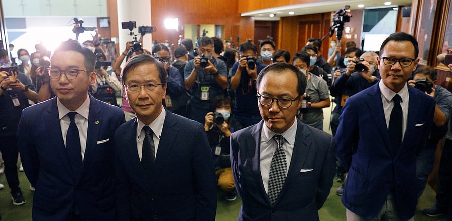 Former pan-democratic legislators Alvin Yeung Ngok-kiu, Kwok Ka-ki, Kenneth Leung and Dennis Kwok speak to the media after they were disqualified when China passed a new resolution in Hong Kong. Credit: Reuters Photo