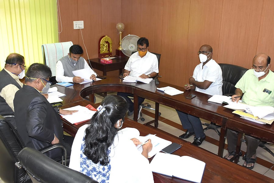 Medical Education Minister Dr K Sudhakar chairs a meeting at Mysuru Medical College and Research Institute in Mysuru on Wednesday.