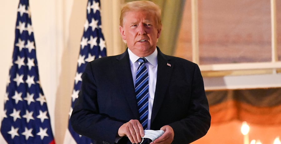 Donald Trump and the patchwork of businesses he houses inside the Trump Organization are saddled with more than $1 billion in debt. Credit: Reuters Photo