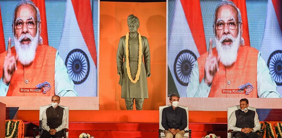 Prime Minister Narendra Modi addresses a gathering after virtually unveiling the statue of Swami Vivekananda at JNU campus. Credit: PTI