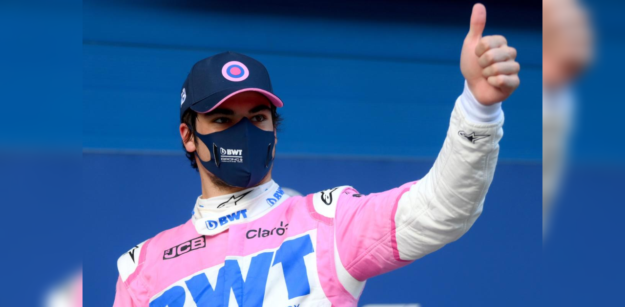 Pole position Racing Point's Canadian driver Lance Stroll celebrates after the qualifying session at the Intecity Istanbul Park circuit in Istanbul on November 14, 2020 ahead of the Turksish Formula One Grand Prix. Credit: AFP Photo