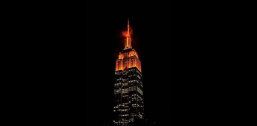 The Empire State Building lit up in orange in Midtown Manhattan. Credit: PTI Photo