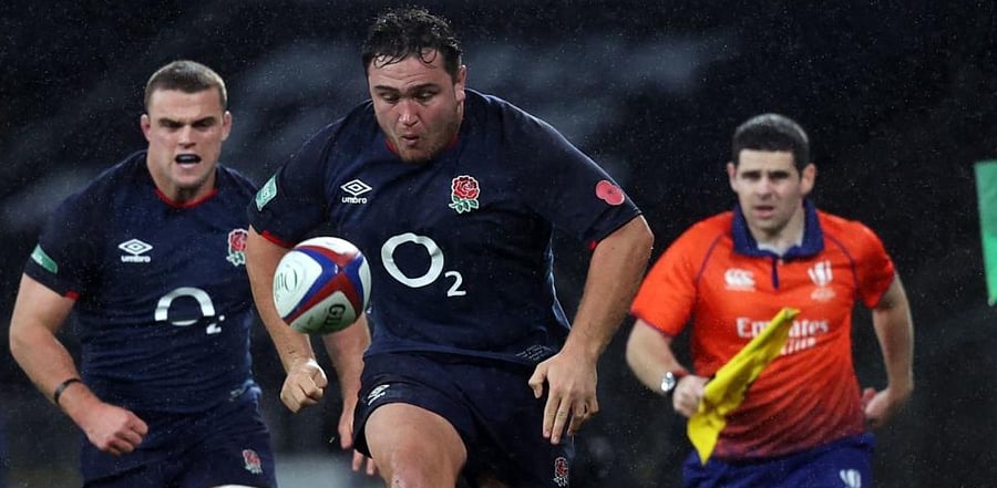 England's hooker Jamie George (C) kicks ahead during the Autumn Nations Cup international rugby union match between England and Georgia at Twickenham. Credit: AFP.