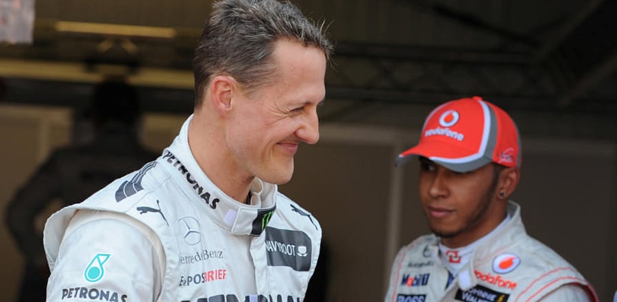 Mercedes' Michael Schumacher (L) with McLaren's Lewis Hamilton. Credit: Reuters Photo