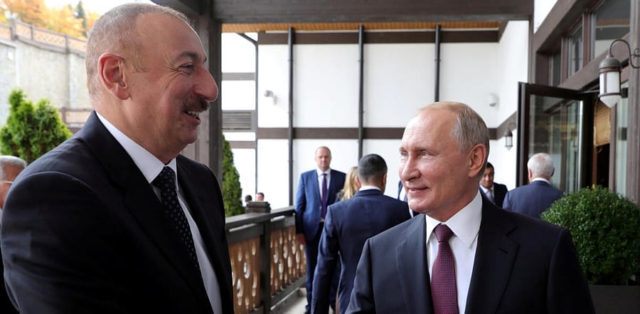 Russia's President Vladimir Putin shakes hands with Azerbaijan's President Ilham Aliyev during their meeting in Sochi. Credit: Reuters