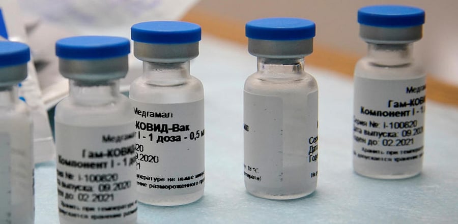 Bottles with Russia's "Sputnik-V" vaccine against the coronavirus disease (COVID-19) are seen before inoculation at a clinic in Tver, Russia October 12, 2020. Credit: Reuters File Photo