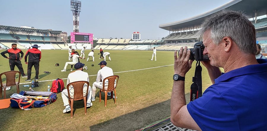 Former Australian cricket captain Steve Waugh takes pictures on a DSLR camera during a lunch break of Ranji Trophy cricket match. Credit: PTI