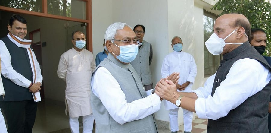 JD(U) National President Nitish Kumar meeting with Union Defence Minister Rajnath Singh at his officials residence. Credit: PTI.