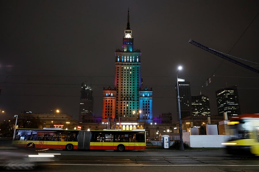   Palace of Culture and Science is illuminated in rainbow colours in a gesture of solidarity with the LGBT community during International Day of Tolerance in Warsaw, Poland, November 16, 2020. Credit: REUTERS