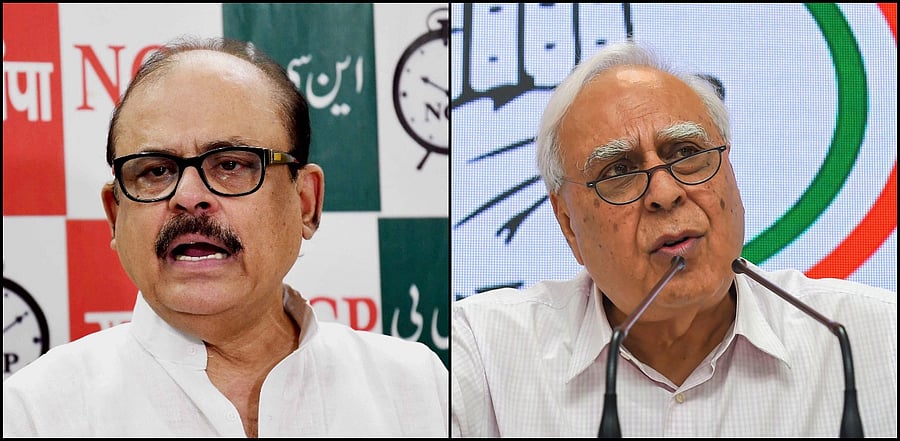 Tariq Anwar and Kapil Sibal (L-R) Credit: PTI