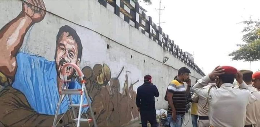 Painting of anti-CAA activist Akhil Gogoi in Guwahati. Credit: DH