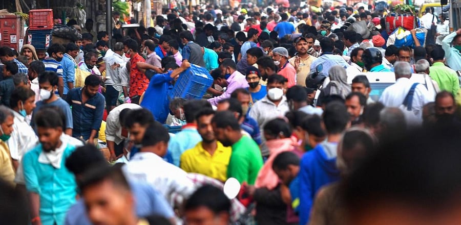 People gather to shop at an air vegetable market early in the morning in Mumbai on November 20, 2020. Credit: AFP Photo