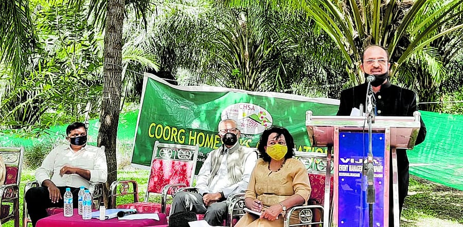 Coorg Homestay Owners’ Association president B G Ananthashayana speaks during the annual general meeting of the association in Kushalnagar on Sunday.