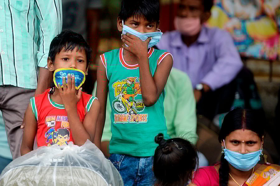 Children of stranded migrant workers. Credit: AFP Photo