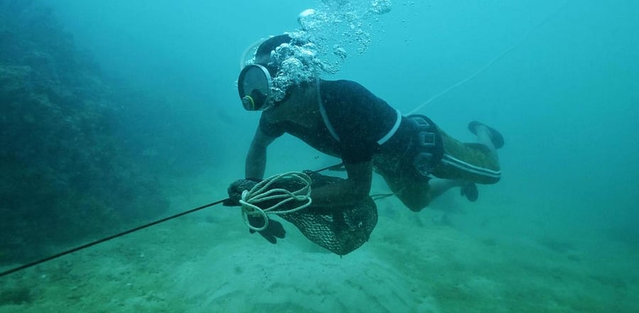 Moken fisherman Sanam Changnam hunting for fish off the coast of Thailand. Credit: AFP Photo