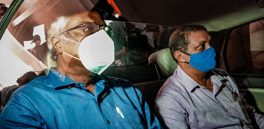 Suspended IAS officer M Sivasankar being taken to ACJM special court in connection with the Kerala gold smuggling case. Credit: PTI Photo