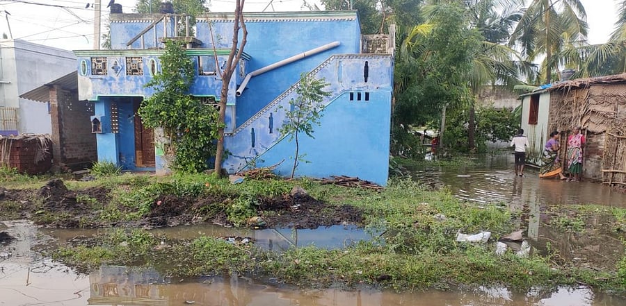 Water entered many houses and water stood at knee-length on Thursday evening in the locality. Credit: DH photo/ETB Sivapriyan.