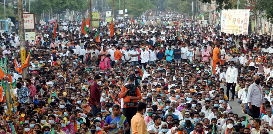 Tamil Nadu BJP President L Murugan along with party workers participates in party's 'Vetrivel Yatra', amid the ongoing coronavirus pandemic, in Coimbatore on November 22. Credit: PTI Photo