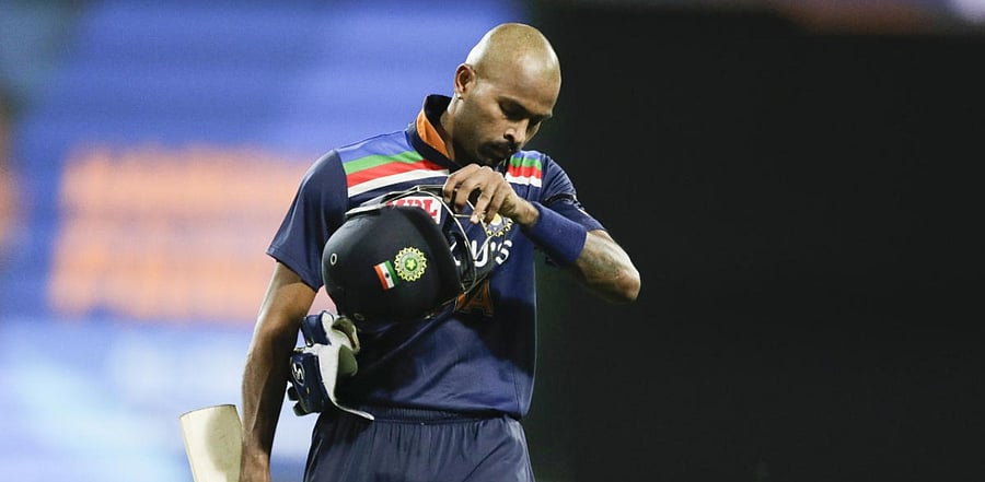 India's Hardik Pandya walks from the field after he was dismissed for 90 runs during the one day international cricket match between India and Australia. Credit: AP/PTI Photo