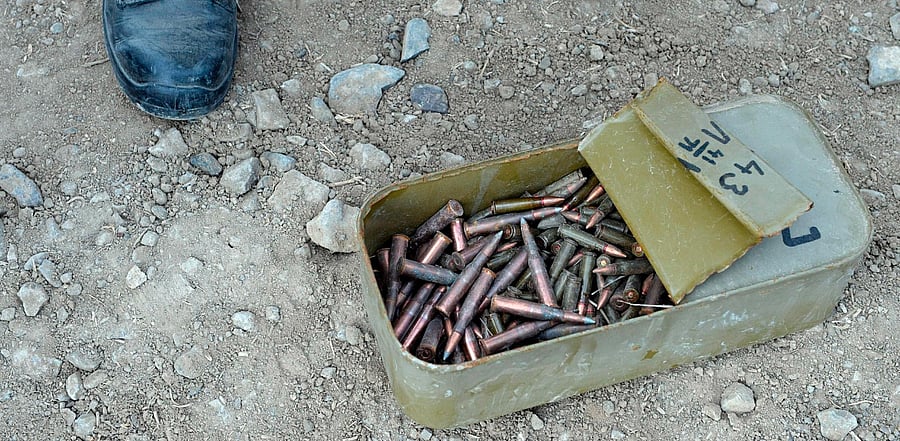 Azerbaijan military sapper stands near the ammunition box in the countryside outside the town of Hadrut on November 28, 2020. Credit: AFP Photo