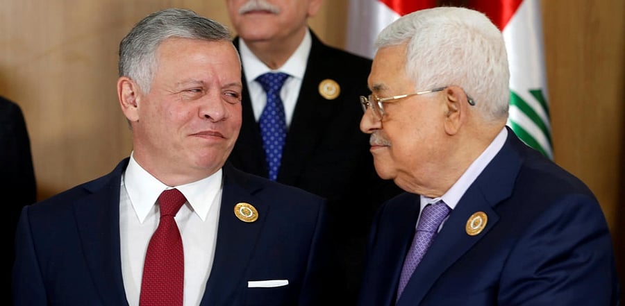 Jordan's King Abdullah II speaks with Palestinian President Mahmoud Abbas. Credit: Reuters Photo