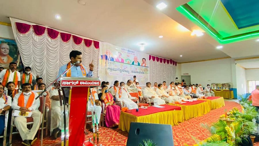 BJP vice president B Y Vijayendra speaks during the Gram Swaraj meeting in the wake of the Gram Panchayat elections at Hunsur, Mysuru district, on Monday. DH PHOTO
