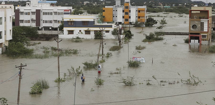 An aerial view of flooded Mudichur area following heavy rain triggered by Cyclone Nivar, in Chennai. Credit: PTI Photo