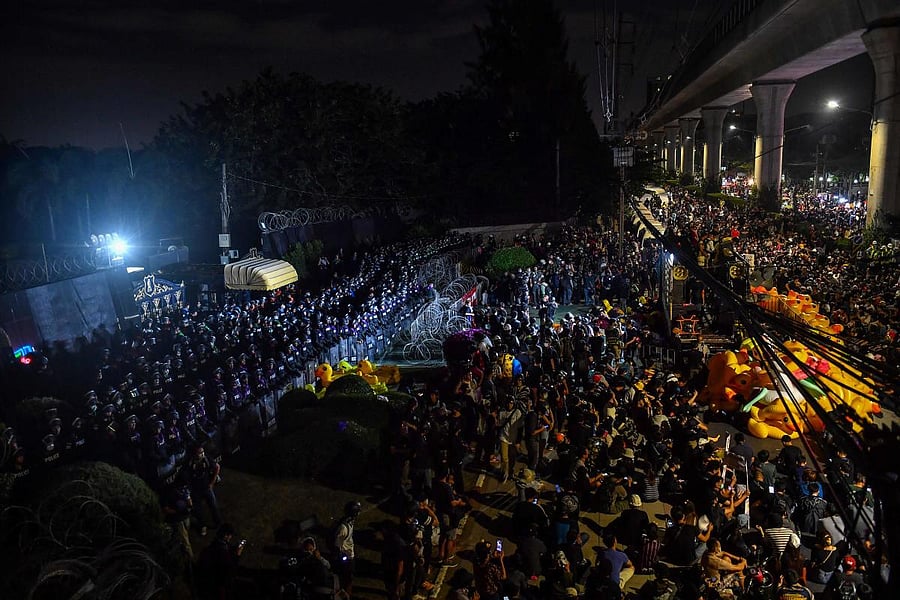 Riot police stand guard in front of the 11th Infantry Regiment as pro-democracy protesters take part in an anti-government rally in Bangkok. Credit: AFP