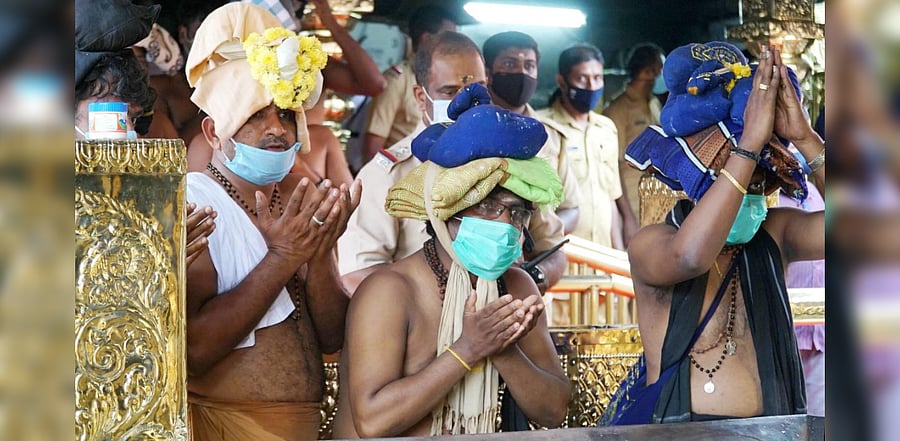 Devotees offer prayers at Lord Ayyappa temple, in Sabarimala, Pathanamthitta,Tuesday, Nov. 17, 2020. Credit: PTI Photo