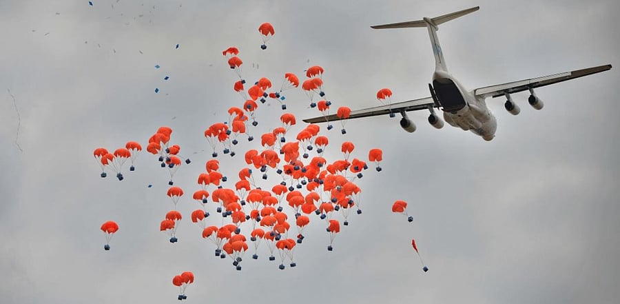 World Food Programme (WFP) makes a drop of food aid near a village in Ayod county, South Sudan. Credit: AFP Photo