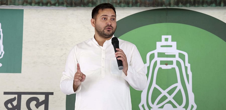 RJD leader Tejashwi Yadav speaks at the party legislators' meeting in Patna. Credit: PTI Photo