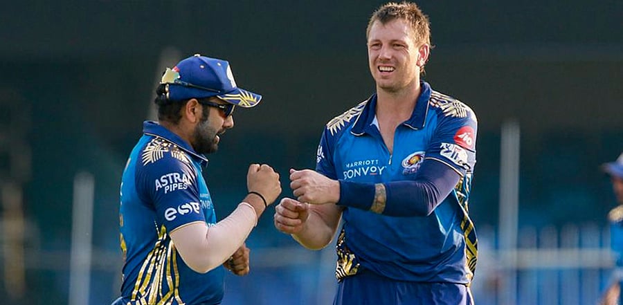 Mumbai Indians player James Pattinson celebrates after taking the wicket of Sunrisers Hyderabad player Manish Pandey during IPL 2020 cricket match, at Sharjah Cricket Stadium in Sharjah, United Arab Emirates, Sunday, Oct. 4, 2020. Credit: PTI Photo