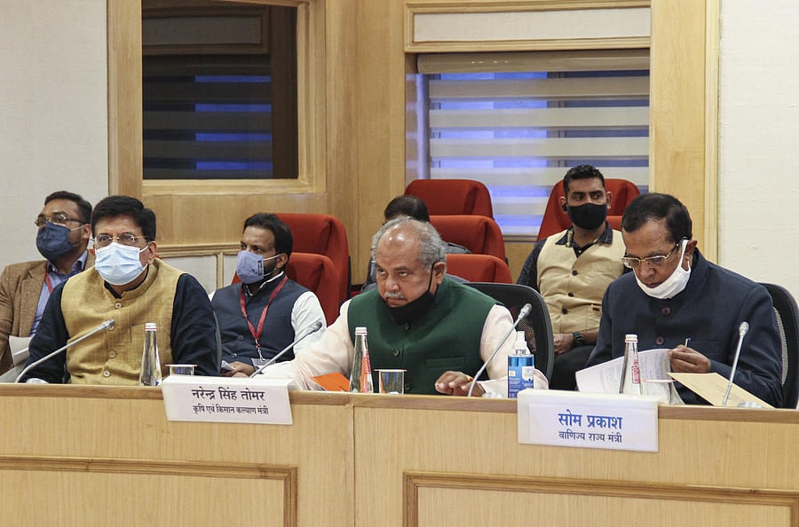 Union Minister for Farmers' Welfare Narendra Singh Tomar along with Union Minister for Commerce and Industry Piyush Goyal and MoS for Commerce Som Prakash during a meeting with farmers over the new farm laws, at Vigyan Bhawan in New Delhi, Thursday, Dec. 3, 2020. Credit: PTI Photo